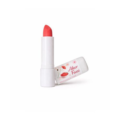 Aker Fassi lip balm in a white lipstick tube with gold accents, featuring the Revive & Glow logo, displayed on a clean white background.