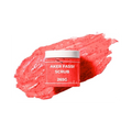 Jar of Aker Fassi scrub with a red scrub sample on a white background