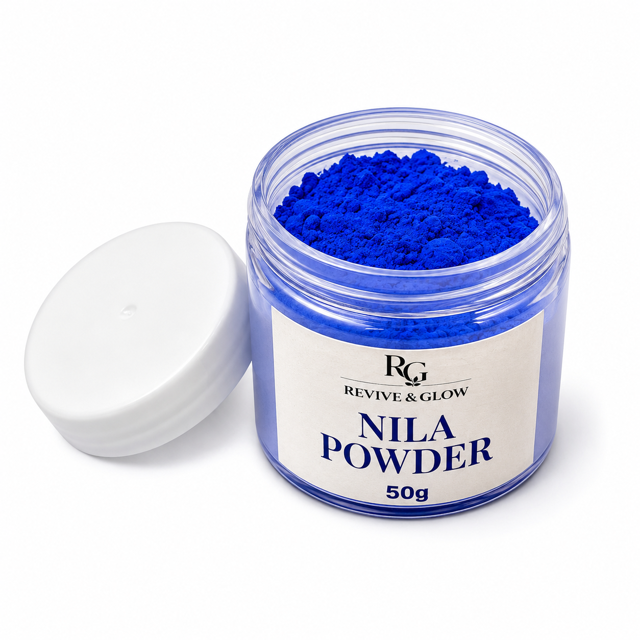 A clear plastic jar filled with vivid royal blue powder, shown with its white lid off beside it on a clean white background. The label reads 'RG REVIVE & GLOW NILA POWDER 50g'.
