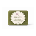 Green soap bar with a white label on a white background