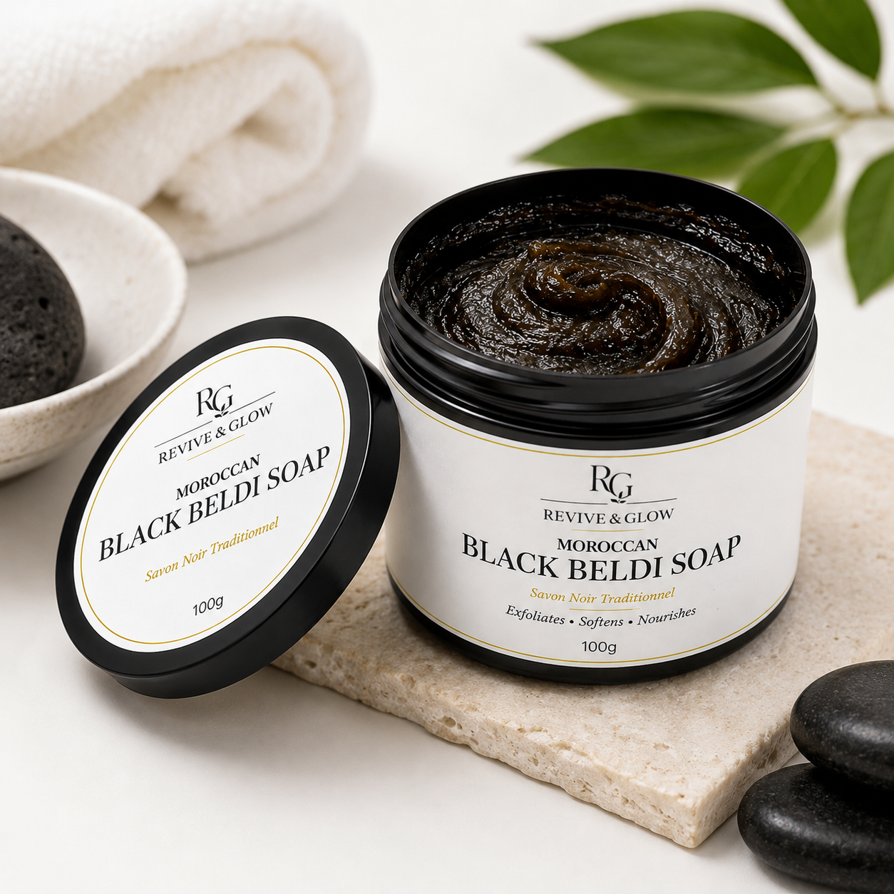 Open jar of Revive & Glow Moroccan Black Beldi Soap 100g showing the rich traditional Moroccan black soap texture.