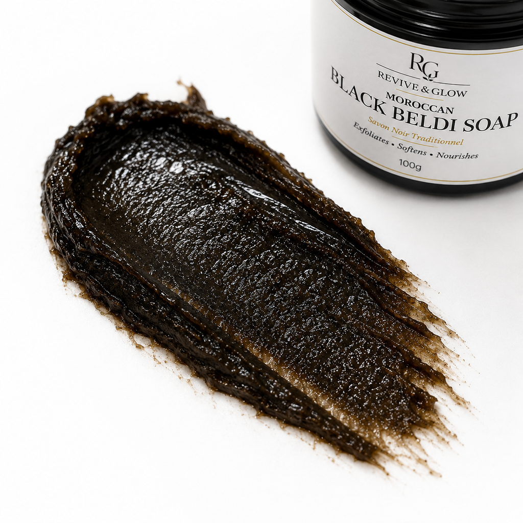 Close-up of authentic Moroccan Black Beldi Soap texture showing its thick, smooth, olive-based consistency.