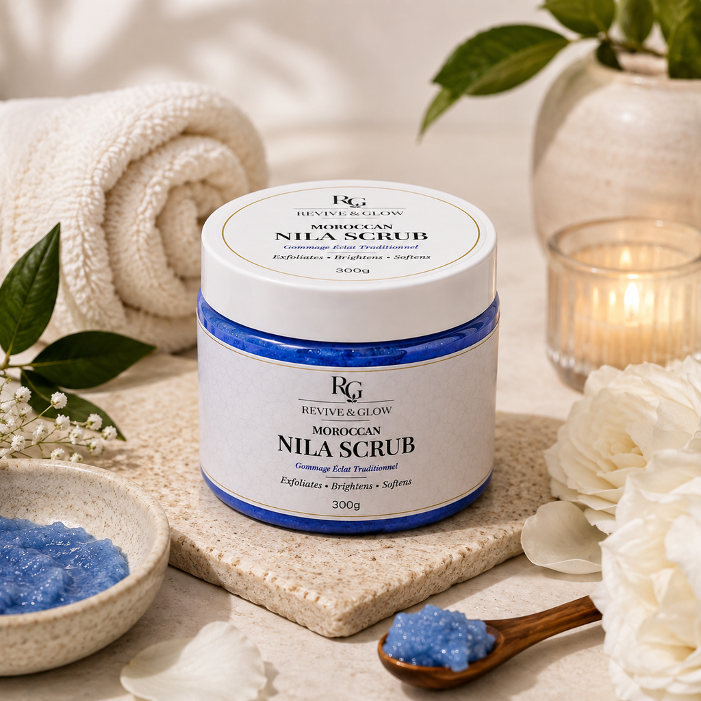 Revive & Glow Moroccan Nila Scrub 300g displayed in a luxury spa setting with towels, flowers and natural skincare accessories.